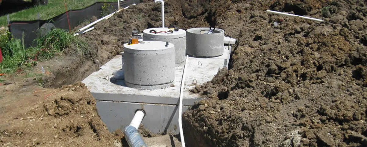 Septic system repair and installation site with tank access ports in Oakland, CA