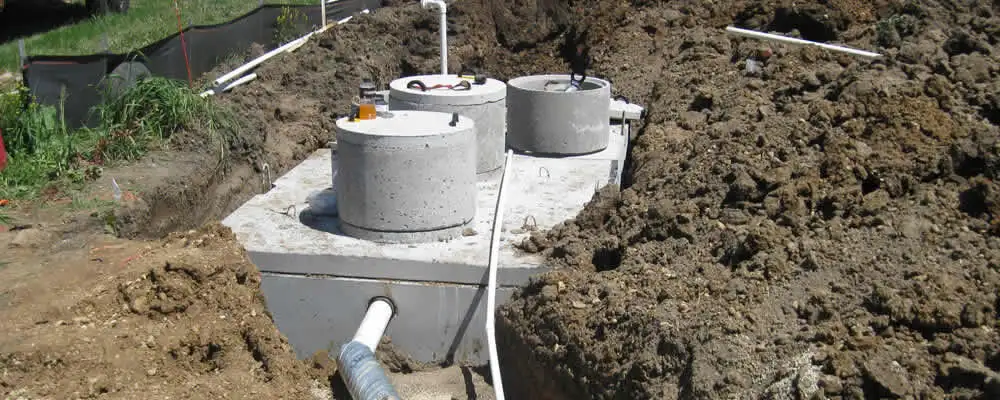 Septic system repair and installation site with tank access ports in Oakland, CA